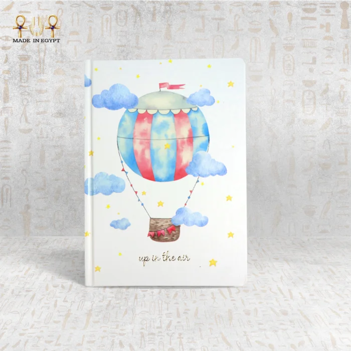 Whimsical hot air balloon notebook with red and blue stripes, clouds, and stars, titled "Up in the Air".