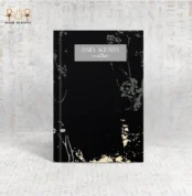 Elegant Winter Daily Agenda notebook with a minimalist black cover and subtle floral accents.