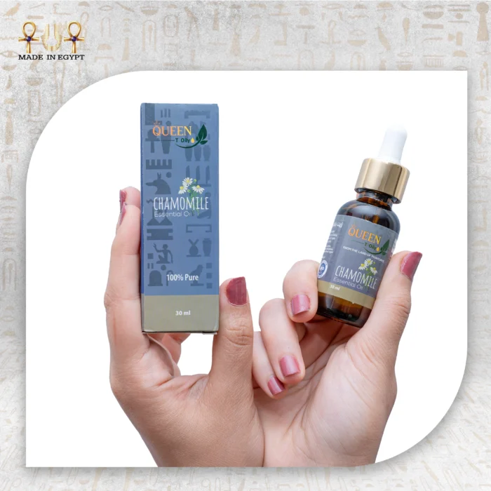 Chamomile Essential Oil, 30ml, bottle held with packaging box visible.