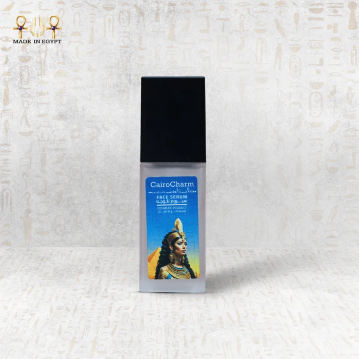 Close-up of CairoCharm Face Serum bottle with sleek design.