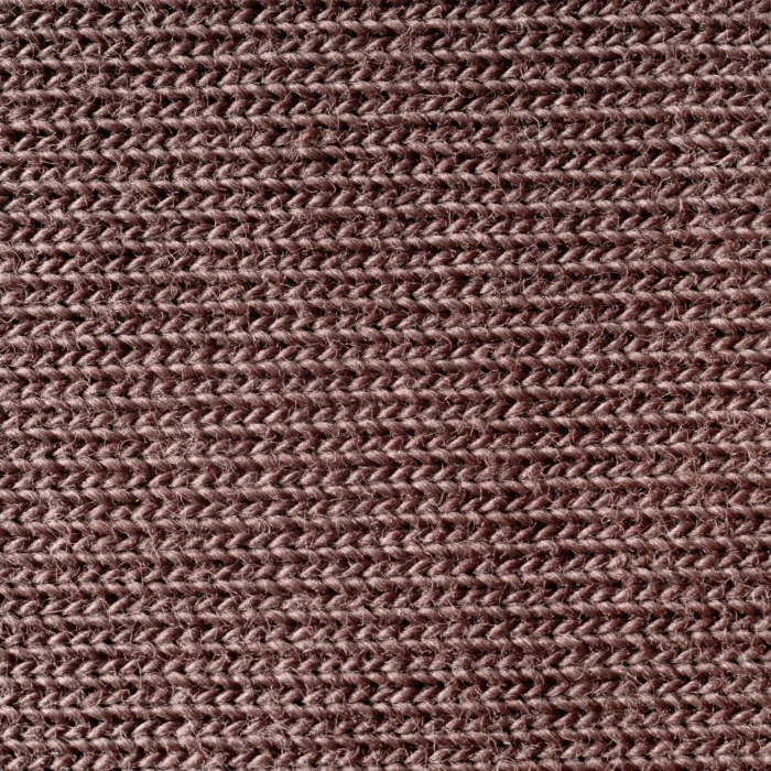 Close-up of the Fusion Tee fabric, showcasing the texture and weave of the brown cotton material.