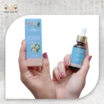 Jasmine Essential Oil, 30ml, bottle held with packaging box visible.