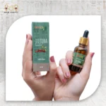 Jojoba Essential Oil, 30ml, bottle held with packaging box visible.