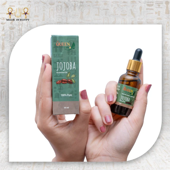 Jojoba Essential Oil, 30ml, bottle held with packaging box visible.