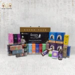 Queen Tiye Natural Handmade Soap Pack with various soap bars and essential oils, featuring a premium collection of skincare products.