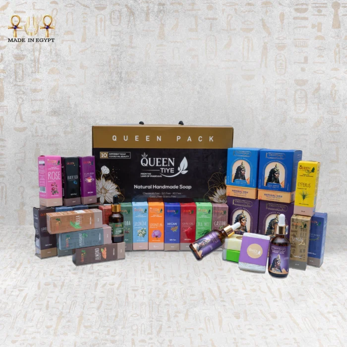 Queen Tiye Natural Handmade Soap Pack with various soap bars and essential oils, featuring a premium collection of skincare products.