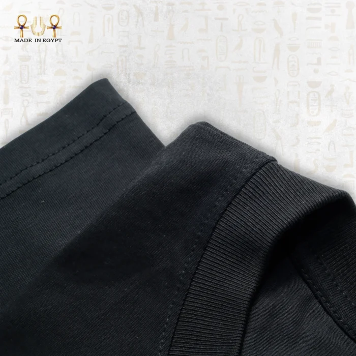 Close-up of the Skyline Tee fabric, showcasing the texture and weave of the black cotton material.