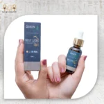 Queen Wheat Germ Essential Oil 30ml in a dropper bottle with box packaging, held in hands.