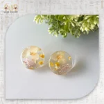 أقراط لمسة الذهب الراتنجية