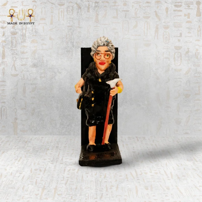 Elderly Woman Figurine - Image 1