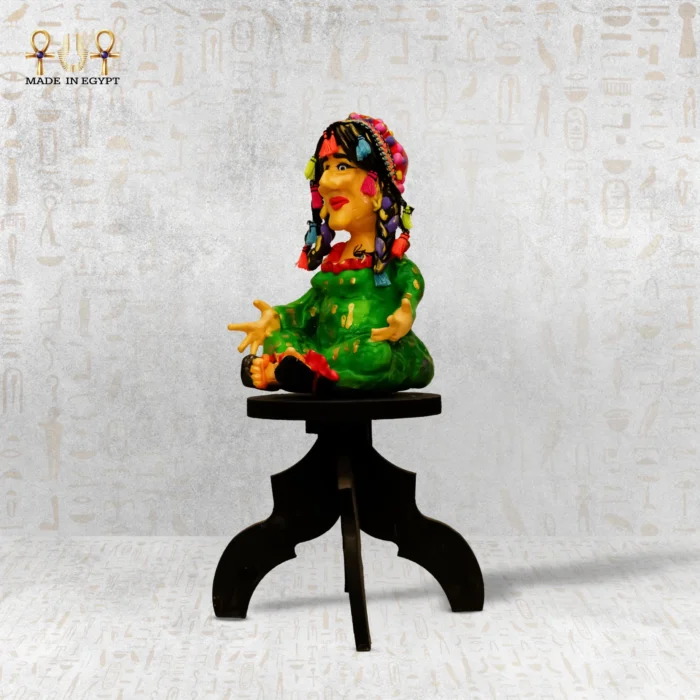 The Seated Woman Figurine - Image 1