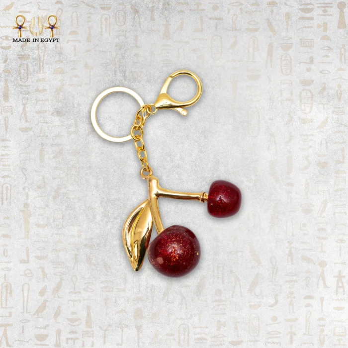 Glossy Cherry Keychain with Gold Details - Image 1