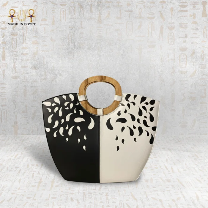 ⁦حقيبة توازن الظل والنور – جلد طبيعي برسم يدوي⁩ - الصورة ⁦1⁩