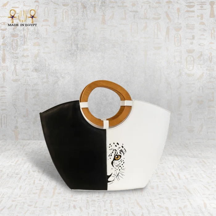 ⁦حقيبة نظرة الفهد – جلد طبيعي برسم يدوي⁩ - الصورة ⁦1⁩