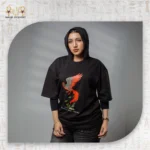 ⁦تيشيرت أوفر سايز بطبعة طائر الفينيق⁩ - الصورة ⁦8⁩